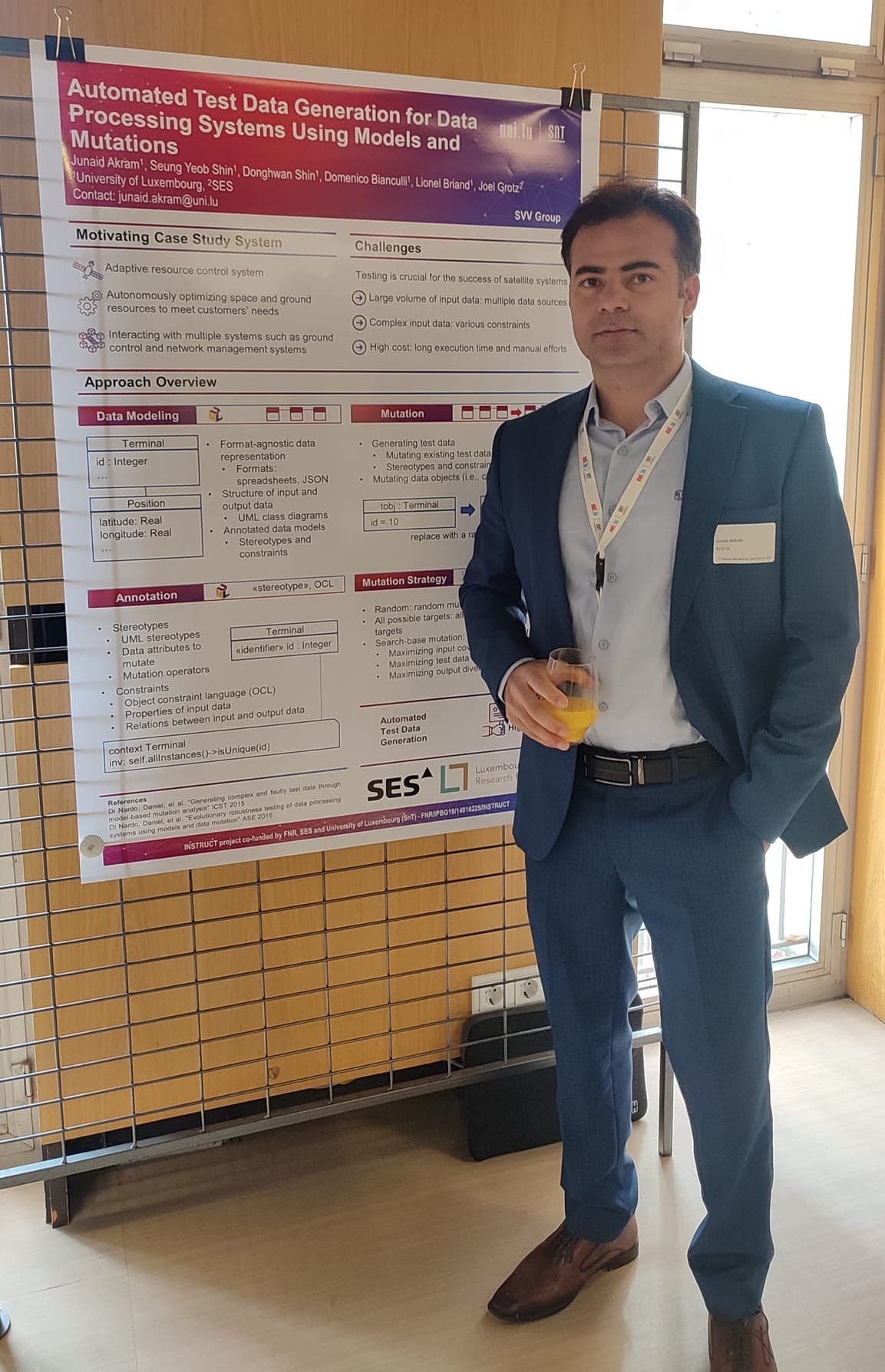 Dr. Junaid Akram presenting automated test data generation research poster